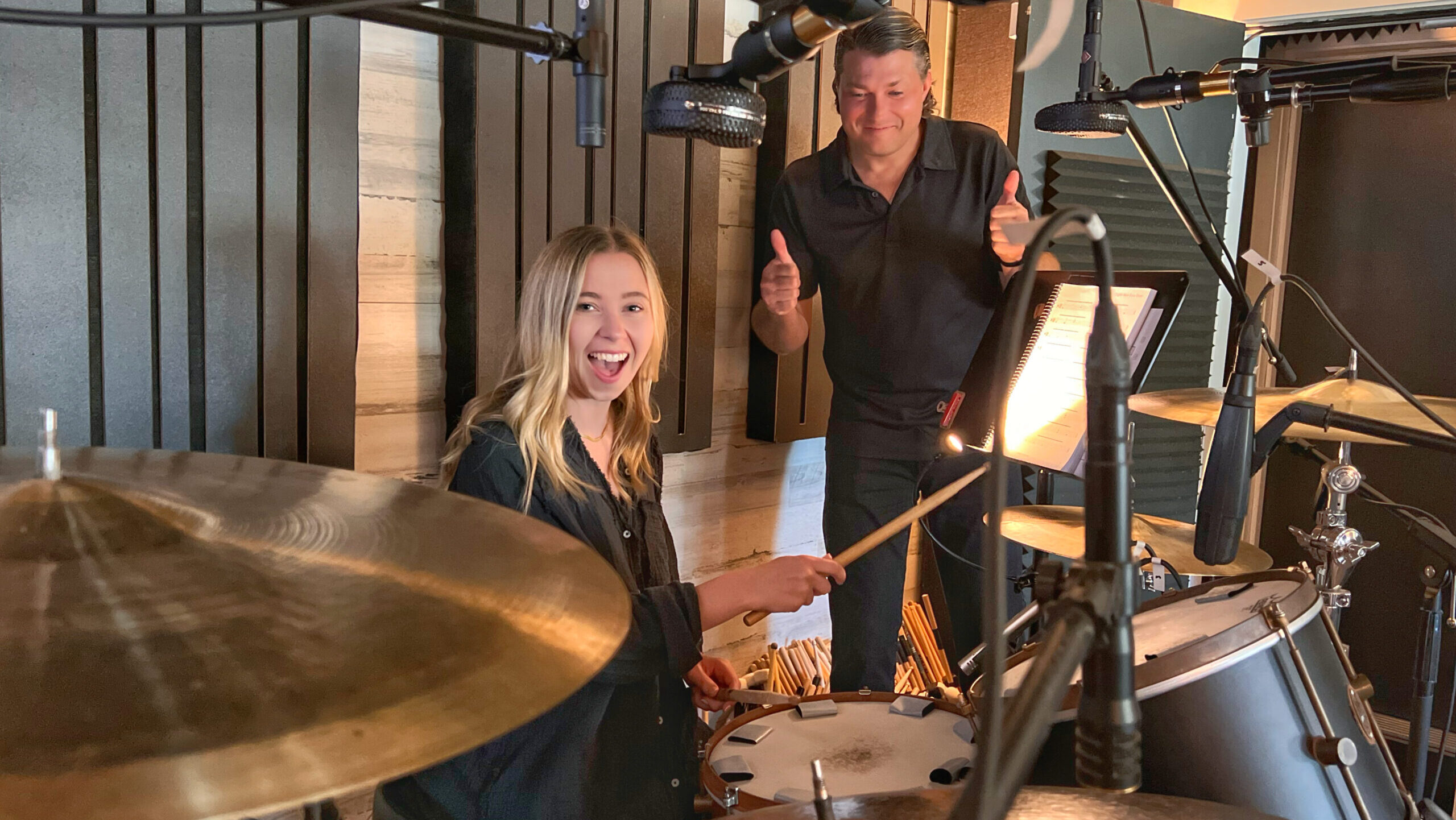 Blake Paulson teaching a young adult female student during a private drum lesson at Vose Street Sound music studio